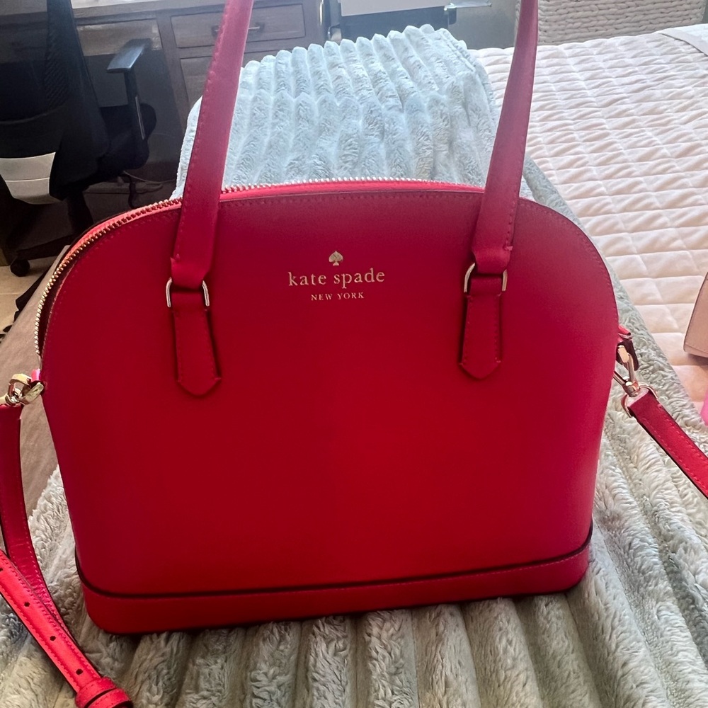 Kate Spade hot pink purse. Carried once. Like new.